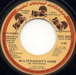 ouvir online Attitudes - In A Strangers Arms
